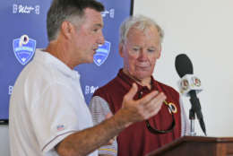 Washington Redskin general manager, Bruce Allen, left, announced that former Redskins GM Bobby Beathard, right, will be inducted in the Redskins Ring of Fame during a press conference at the Washington Redskins NFL football teams training camp in Richmond, Va., Saturday, July 30, 2016. (AP Photo/Steve Helber)