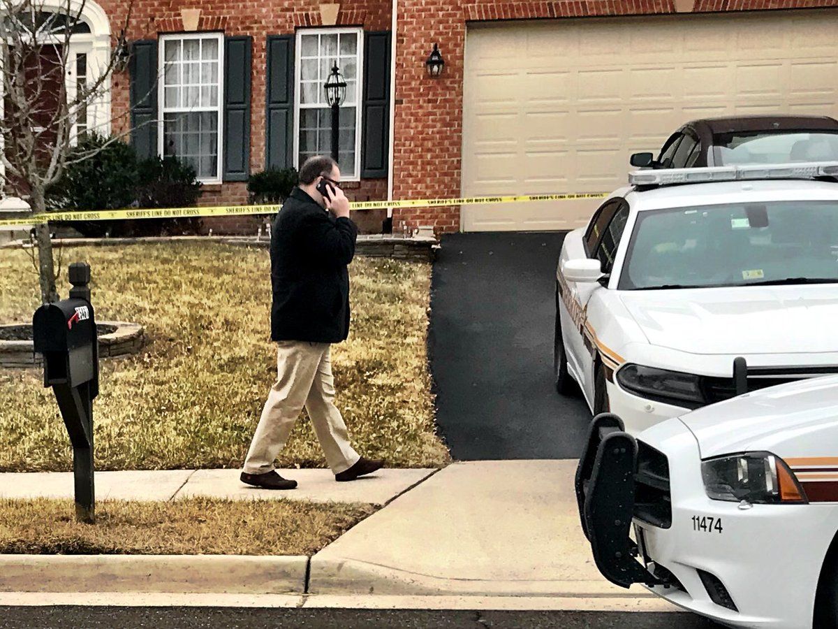 Homicide detectives investigate the death of a mother and her grown son in Loudoun County Thursday morning. (WTOP/Neal Augenstein)
