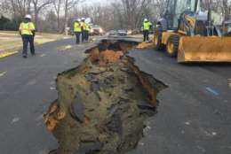 A water main break in the 4500 block of Twinbrook Road near Pickett Road caused a sinkhole, Fairfax County police tweeted Friday afternoon. (Courtesy Fairfax County police)