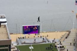 Nik Wallenda did it again: The high-wire entertainer walked on a wire 75 feet up and as wide as a nickel at National Harbor. (WTOP/Nick Iannelli)