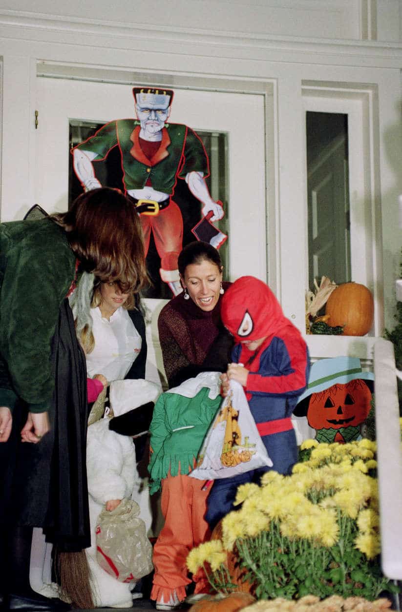 Marilyn Quayle, wife of Vice President Dan Quayle, hands out treats to children at the Vice Presidential residence in Washington  Saturday, Oct. 31, 1992. Quayle welcomed trick or treaters to the home, while her husband spent the day campaigning. (AP Photo/Dennis Cook)