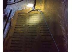 Blocked catch basin on Metro's Red Line between Friendship Heights and Van Ness. (Photo courtesy FTA)