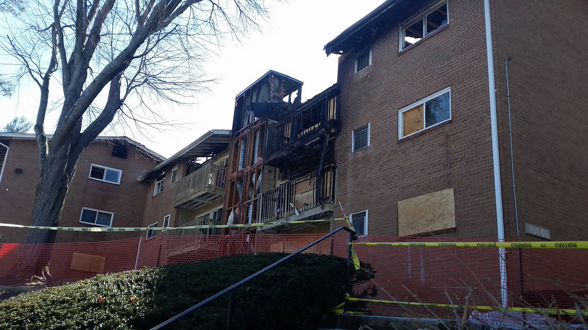 Sixty people were displaced when three buildings were destroyed in Friday's fire. (WTOP/Kathy Stewart)