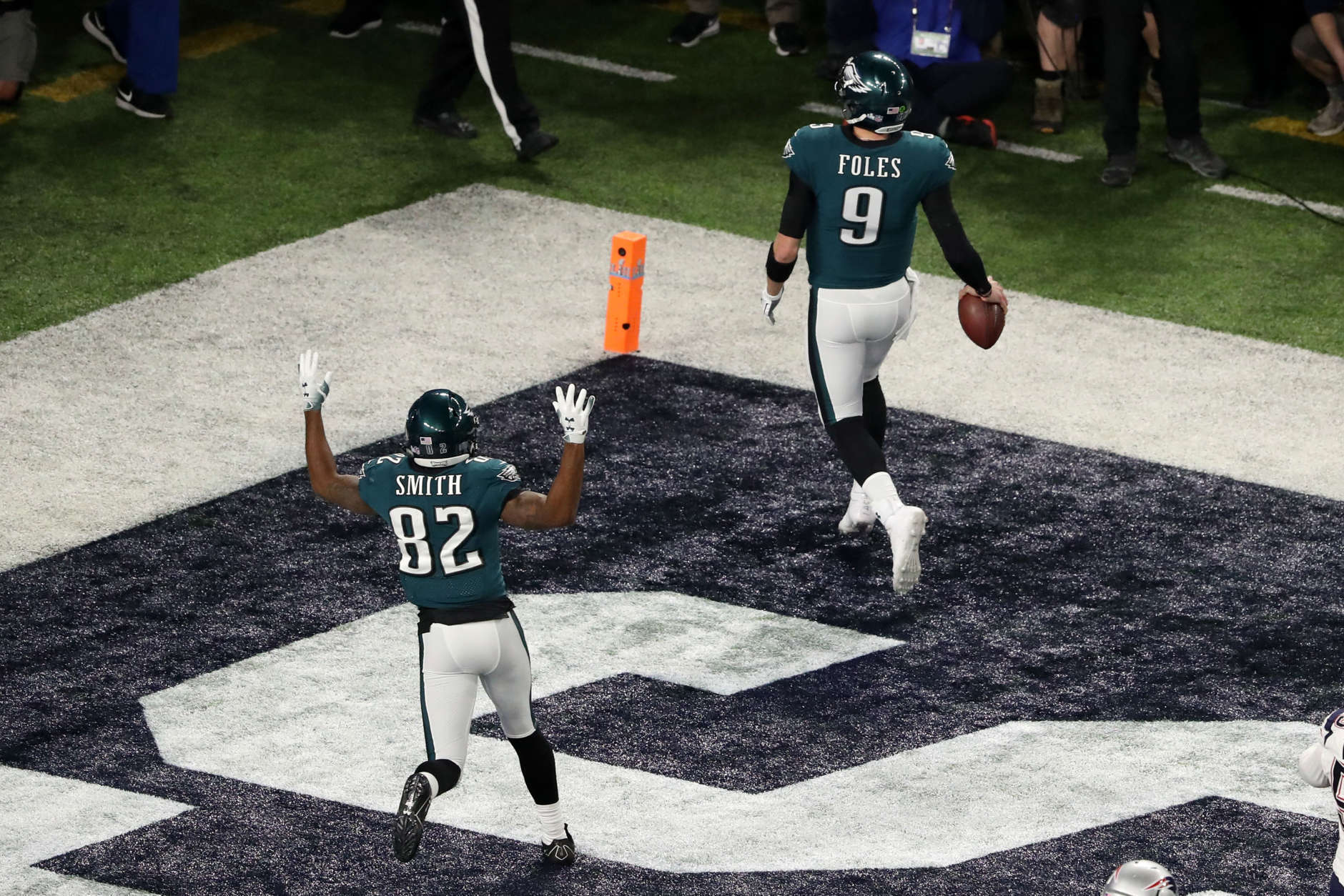 MINNEAPOLIS, MN - FEBRUARY 04:  Nick Foles #9 of the Philadelphia Eagles is congratulated by his teammate Torrey Smith #82 after his 1-yard touchdown reception during the second quarter against the New England Patriots in Super Bowl LII at U.S. Bank Stadium on February 4, 2018 in Minneapolis, Minnesota.  (Photo by Christian Petersen/Getty Images)