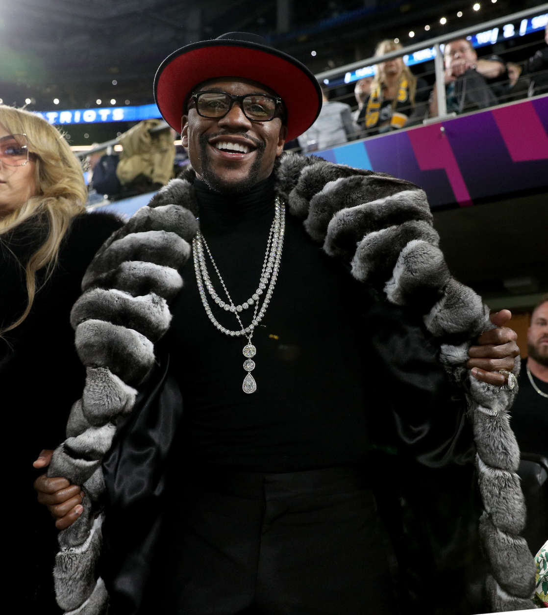 MINNEAPOLIS, MN - FEBRUARY 04:  Boxer Floyd Mayweather Jr. looks on during Super Bowl LII between the New England Patriots and the Philadelphia Eagles at U.S. Bank Stadium on February 4, 2018 in Minneapolis, Minnesota.  (Photo by Patrick Smith/Getty Images)