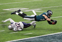 MINNEAPOLIS, MN - FEBRUARY 04:  Zach Ertz #86 of the Philadelphia Eagles scores an 11-yard fourth quarter touchdown past Devin McCourty #32 of the New England Patriots in Super Bowl LII at U.S. Bank Stadium on February 4, 2018 in Minneapolis, Minnesota.  (Photo by Streeter Lecka/Getty Images)