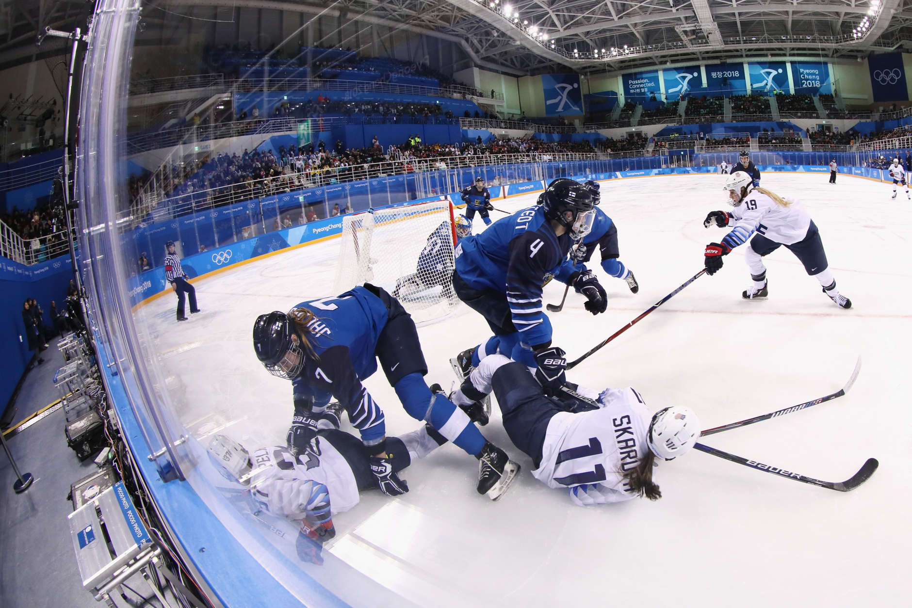 GANGNEUNG, SOUTH KOREA - FEBRUARY 11:  Amanda Pelkey #37 and Haley Skarupa #11 of the United States fall on the ice in the second period against Finland during the Women's Ice Hockey Preliminary Round - Group A game on day two of the PyeongChang 2018 Winter Olympic Games at Kwandong Hockey Centre on February 11, 2018 in Gangneung, South Korea.  (Photo by Bruce Bennett/Getty Images)