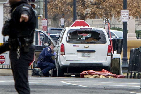 Woman who drove van into White House barrier had a gun, DC police say