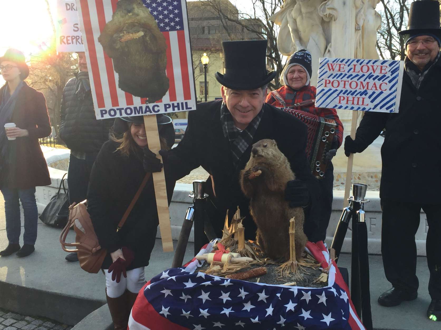 Dozens gathered for the seventh-annual Potomac Phil Groundhog Day celebration in Dupont Circle. (WTOP/John Domen)