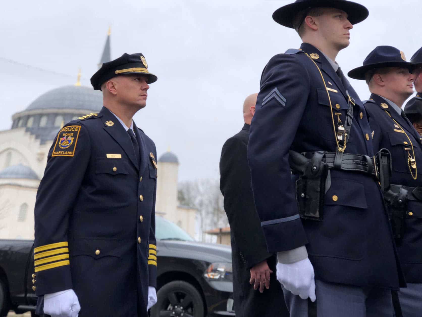 Prince George's County officers pay respects to fallen Cpl. Mujahid Ramzziddin. (WTOP/Kate Ryan)