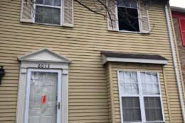 A view of the house where a deadly fire killed an 84-year-old woman in District Heights, Maryland. (WTOP/Kyle Cooper)