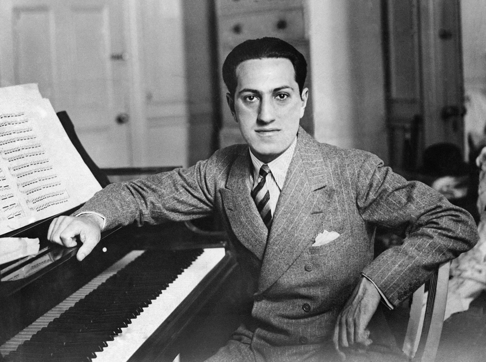 George Gershwin, the modern composer best-known for his Rhapsody in Blue, died in hospital in Hollywood on July 11 after an operation for tumor on the brain. He was 39. George Gershwin shown in file photo, July 12, 1937. (AP Photo)