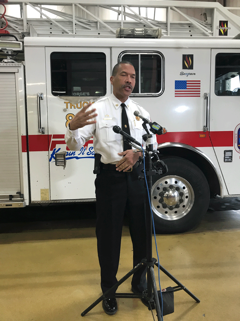 Fire Chief Benjamin Barksdale makes  comments about the hero firefighters. (WTOP/Kyle Cooper) 
