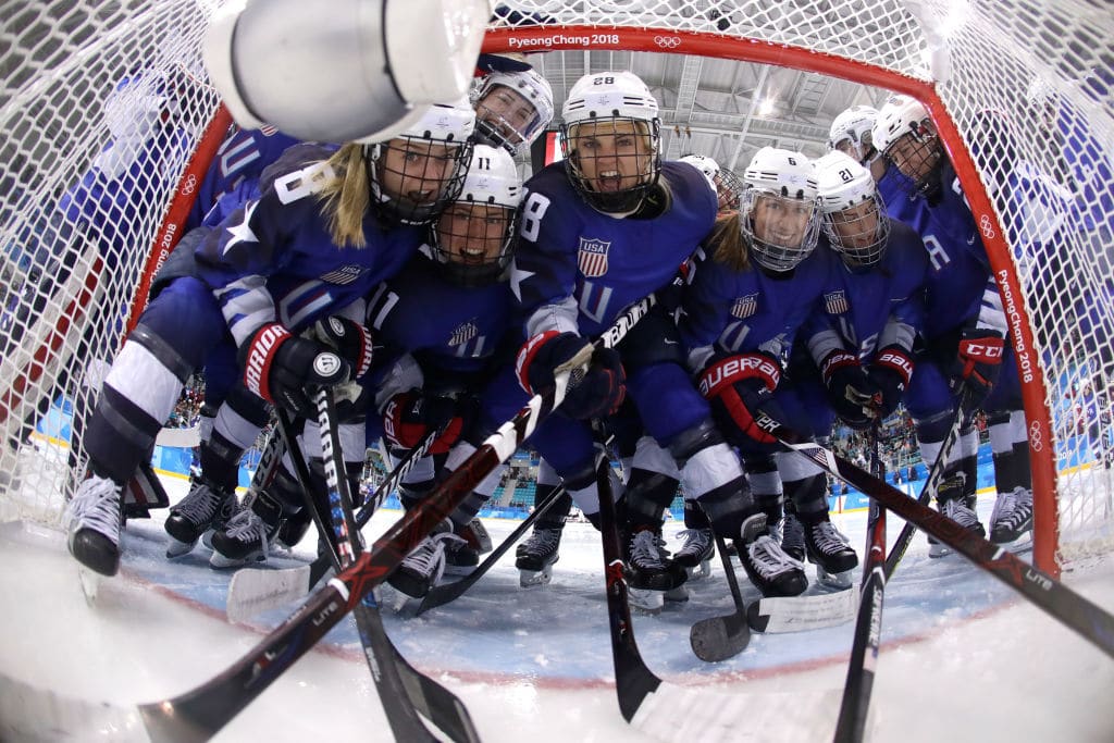 GANGNEUNG, SOUTH KOREA - FEBRUARY 22:  Team United States players pose in the goal prior to the Women's Gold Medal Game against Canada on day thirteen of the PyeongChang 2018 Winter Olympic Games at Gangneung Hockey Centre on February 22, 2018 in Gangneung, South Korea.  (Photo by Frank Franklin II - Pool/Getty Images)