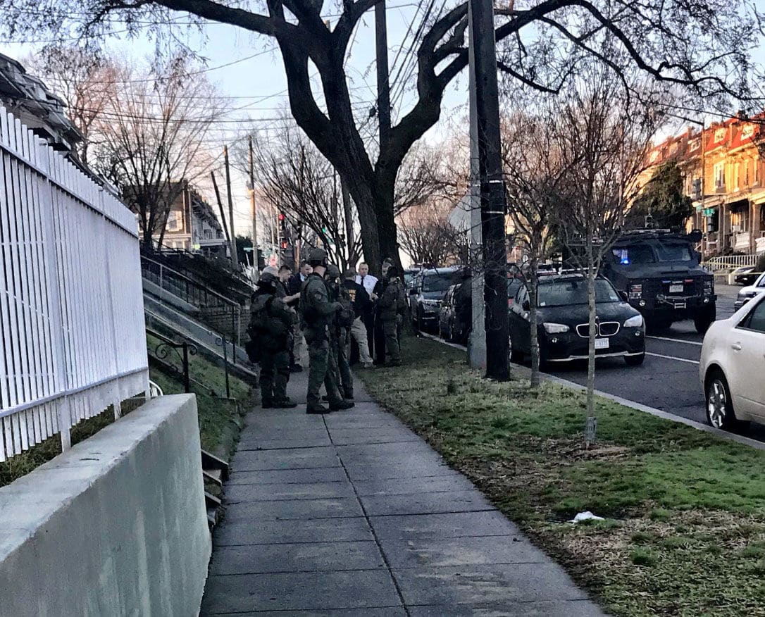 Police converge on Kansas Avenue in Northwest D.C. to investigate a shooting that involved a U.S. Park Police officer on Wednesday, Feb. 21, 2018. (WTOP/Neal Augenstein)