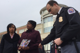 Lydia Banks talks about her daughter Allyssa, who was killed in October 2016. She's supported by Prince George's County State's Attorney Angela Alsobrooks, at left, and Police Chief Hank Stawinski, at right. (WTOP/Kristi King)