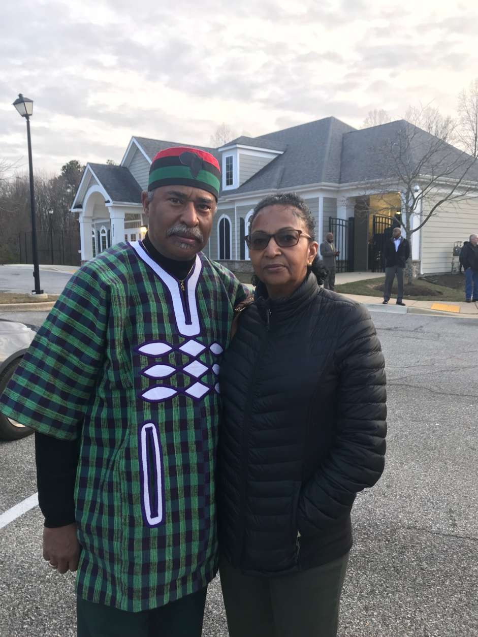 Ron Brown and his wife Wendy attend the vigil of slain Prince George's County police officer Mujahid Ramzziddin. Brown is the uncle of Ramzziddin's wife, Tammi (WTOP/Dick Uliano)