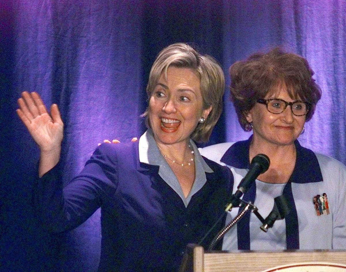 First lady Hillary Rodham Clinton is introduced by U.S. Rep. Louise Slaughter, D-NY, right, during a fundraiser for Slaughter at the Crowne Plaza Hotel in Rochester, N.Y., Friday, Aug. 6, 1999. Mrs. Clinton is continuing her New York "listening tour" into next week. (AP Photo/David Duprey)