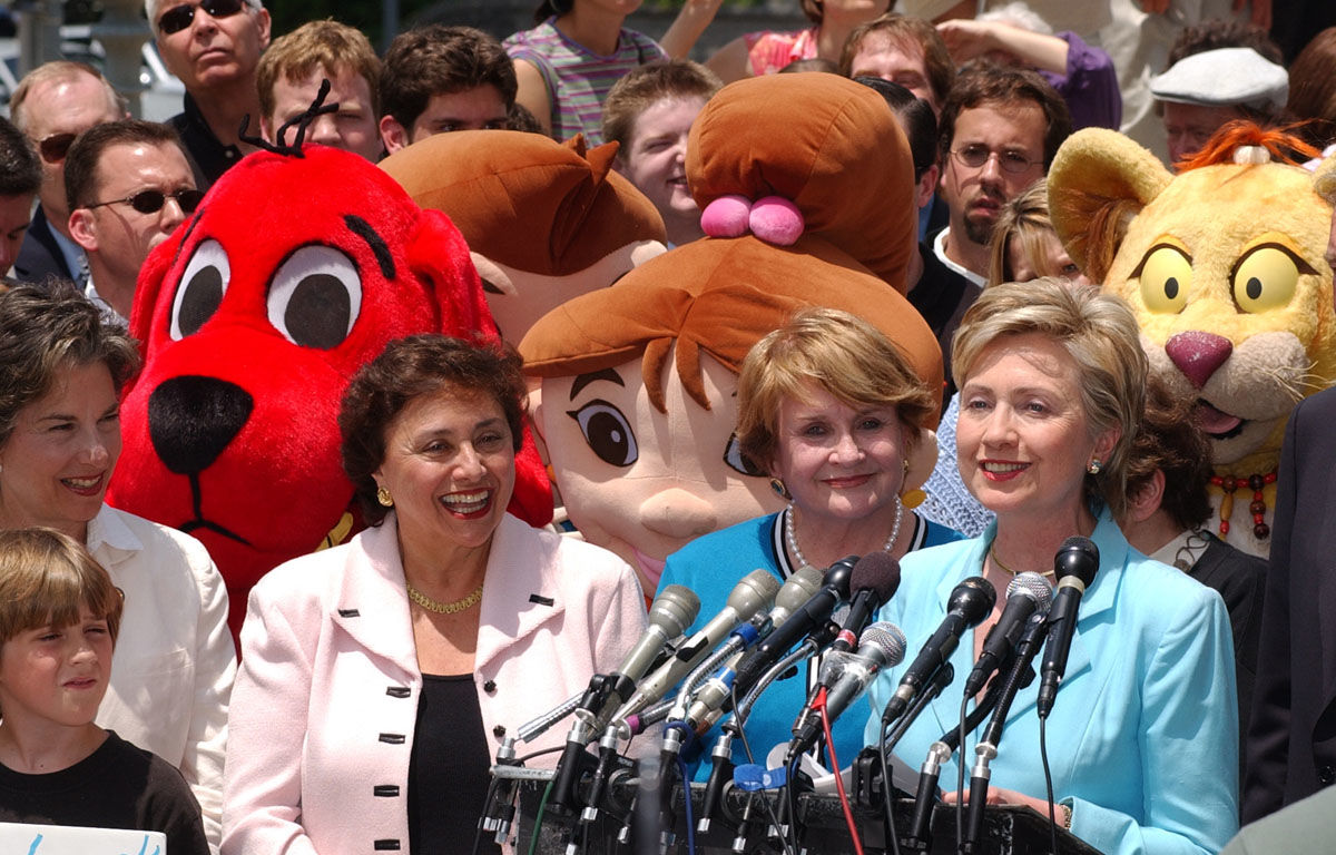 ** CORRECTS IDENTIFICATION OF LOUISE SLAUGHTER ** With Public Broadcasting System characters in the background, Sen. Hillary Rodham Clinton, D-N.Y., right, speaks at a rally on Capitol Hill, Tuesday, June 21, 2005, opposing funding cuts for public broadcasting.  Behind Clinton are Reps. Nita Lowey, D-N.Y., left, and Louise Slaughter, D-N.Y. (AP Photo/Dennis Cook)