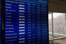 The snow led to lots of cancellations at D.C. area airports. (WTOP/John Aaron)