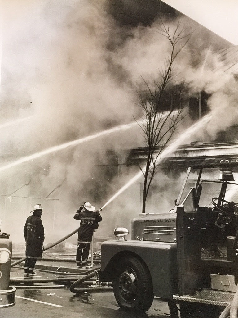 Firefighters battle a blaze. (Courtesy D.C. Fire and EMS Museum)