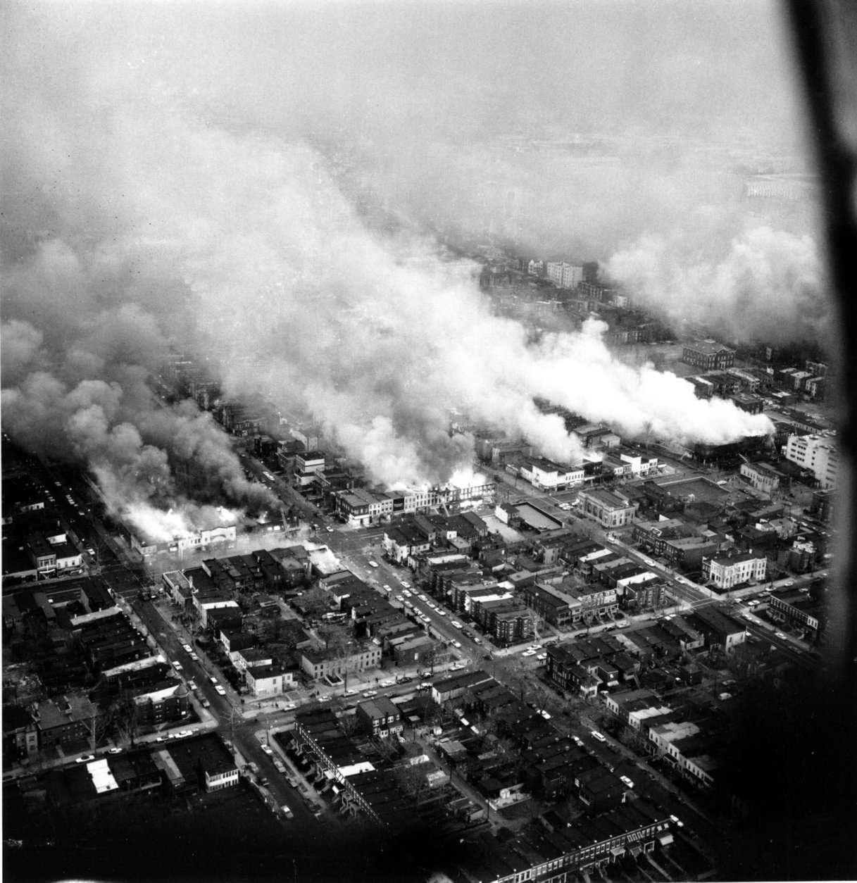 This aerial view shows clouds of smoke rising from burning buildings in northeast Washington, D.C. on April 5, 1968. The fires resulted from rioting and demonstrations after the assassination of Dr. Martin Luther King, Jr. in Memphis, Tenn. on April 4. (AP Photo)