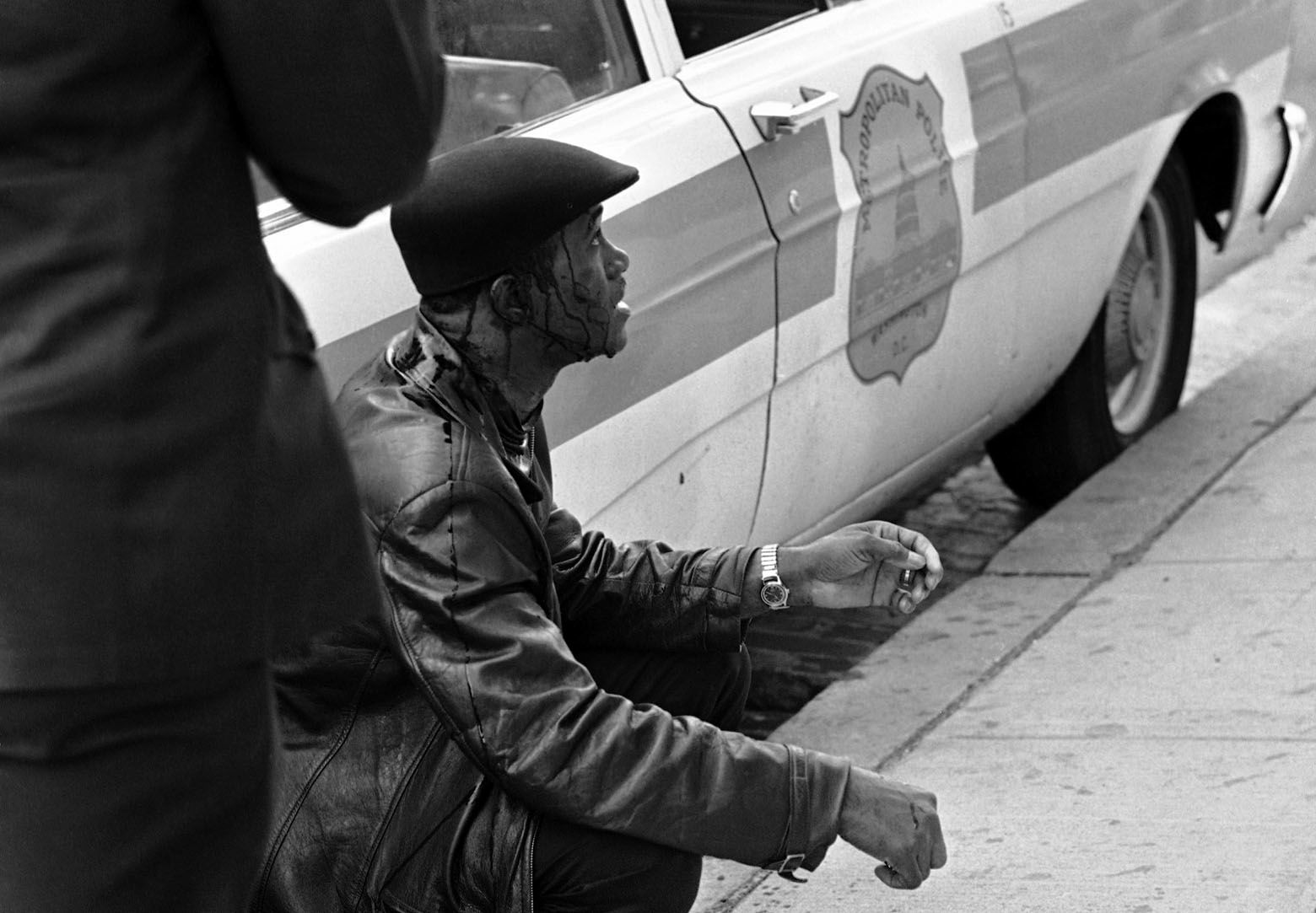 Man was arrested after police reported he fled a house, armed with a .22 caliber pistol, at 11th and K Streets, N.W., on April 7, 1968. He was taken into custody, the police reported, without any shots being fired. (AP Photo/Charles W. Harrity)