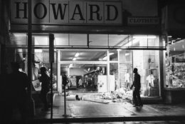 Glass and mannequins litter sidewalk at this clothing store in Northwest Washington, April 4, 1968 after crowds in the predominantly black neighborhood broke into and looted some stores. Crowds gathered following news that Dr. Martin Luther King Jr. had been slain. (AP Photo/Charles Harrity)