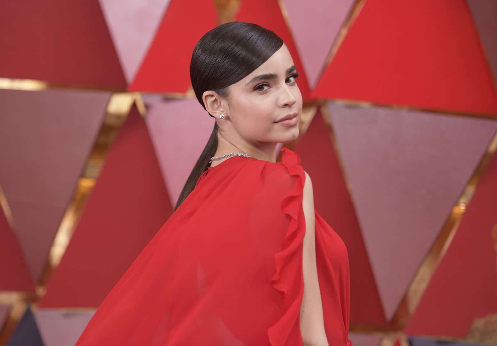 Sofia Carson arrives at the Oscars on Sunday, March 4, 2018, at the Dolby Theatre in Los Angeles. (Photo by Richard Shotwell/Invision/AP)