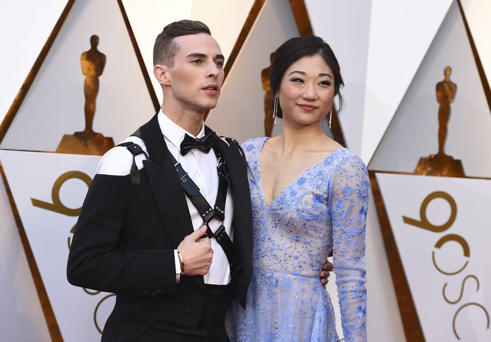 Adam Rippon, left, and Mirai Nagasu arrive at the Oscars on Sunday, March 4, 2018, at the Dolby Theatre in Los Angeles. (Photo by Jordan Strauss/Invision/AP)