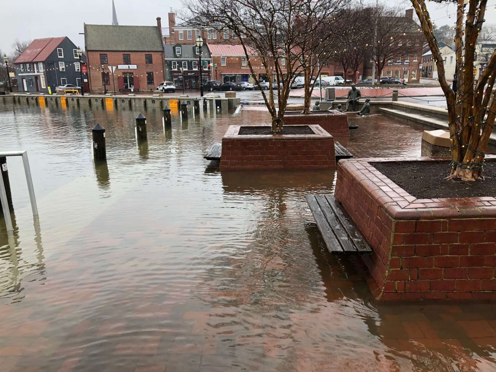 The National Weather Service said a Coastal Flood Warning would remain in effect until 6 p.m., and that water levels were 2 to 3 feet above normal, pushing water up through storm drains. (WTOP/Dave Dildine)