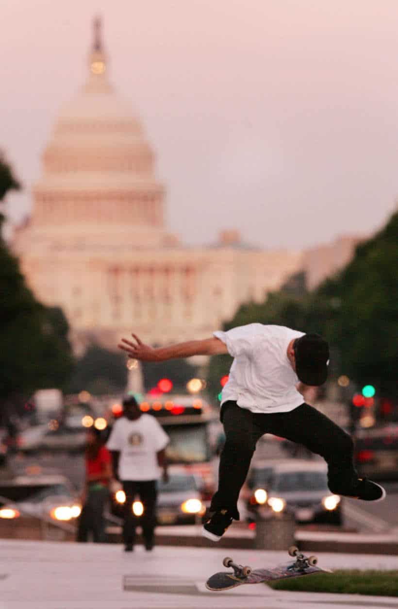 With the U.S. Capitol in the background, Mike Mascelli, of Virginia, skates at Pulaski Park, Tuesday, June 17, 2008, in Washington. (AP Photo/Haraz N. Ghanbari)