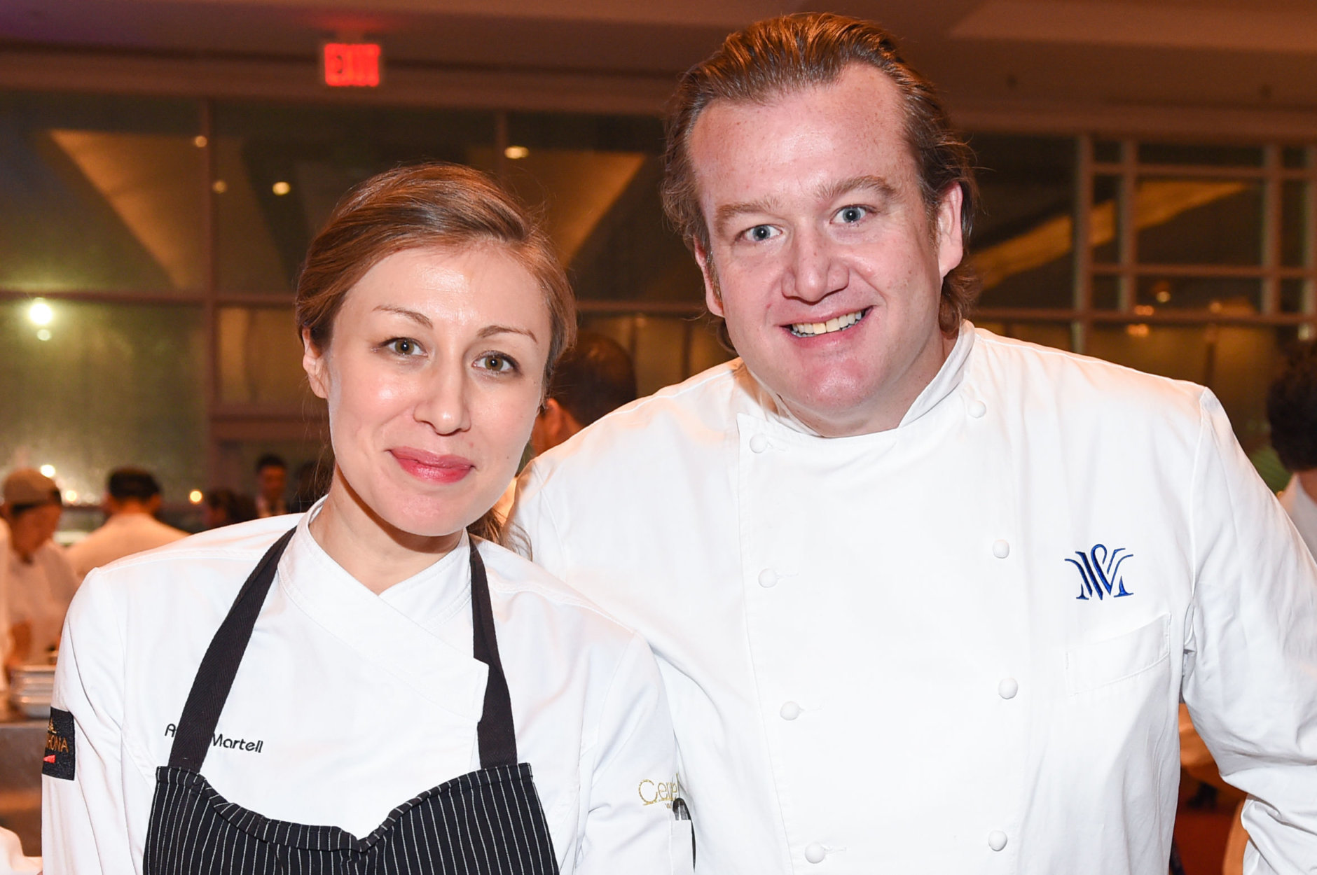 Chefs Alina Martell, left, and Michael White of AltaMarea Group attend the 25th Anniversary Benefit for Careers through Culinary Arts Program (C-CAP) at Pier Sixty on Tuesday, March 3, 2015, in New York. (Photo by Scott Roth/Invision/AP)