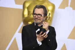 Gary Oldman, winner of the award for best performance by an actor in a leading role for "Darkest Hour", poses in the press room at the Oscars on Sunday, March 4, 2018, at the Dolby Theatre in Los Angeles. (Photo by Jordan Strauss/Invision/AP)