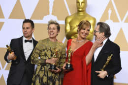 Sam Rockwell, from left, winner of the award for best performance by an actor in a supporting role for "Three Billboards Outside Ebbing, Missouri", Frances McDormand, winner of the award for best performance by an actress in a leading role for "Three Billboards Outside Ebbing, Missouri", Allison Janney, winner of the award for best performance by an actress in a supporting role for "I, Tonya", and Gary Oldman, winner of the award for best performance by an actor in a leading role for "Darkest Hour", pose in the press room at the Oscars on Sunday, March 4, 2018, at the Dolby Theatre in Los Angeles. (Photo by Jordan Strauss/Invision/AP)