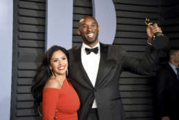 Vanessa Bryant, left, and Kobe Bryant, winner of the award for best animated short for "Dear Basketball", arrive at the Vanity Fair Oscar Party on Sunday, March 4, 2018, in Beverly Hills, Calif. (Photo by Evan Agostini/Invision/AP)
