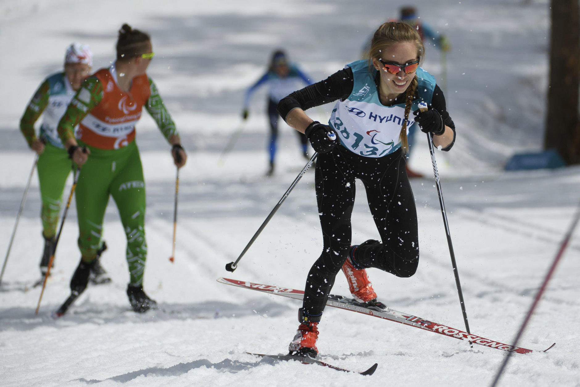 Mikhalina Lysova of Neutral Paralympic Athlete competes during the Cross Country Skiing Women's Visually Impaired 7,5km Classic at the Alpensia Biathlon Centre in Pyeongchang, South Korea at the 2018 Winter Paralympics Saturday, March 17, 2018. (Thomas Lovelock/OIS/IOC via AP)
