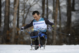 China's Lu Jingfeng competes during the Cross Country Skiing Men's Sitting 7.5km at the Alpensia Biathlon Centre, in the Paralympic Winter Games, Daengwallyeong-myeon, South Korea, Saturday, March 17, 2018. (Thomas Lovelock/OIS/IOC via AP)