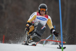 Linda Van Impelen of the Netherlands competes in the Alpine Skiing Sitting Women's Slalom at the Jeongseon Alpine Centre in Jeongseon, South Korea at the 2018 Winter Paralympics Sunday, March 18, 2018. (Simon Bruty/OIS/IOC via AP)