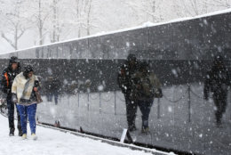 The Vietnam Veterans Memorial on the National Mall in Washington during the Spring snow storm, Wednesday, March 21, 2018. (AP Photo/Manuel Balce Ceneta)