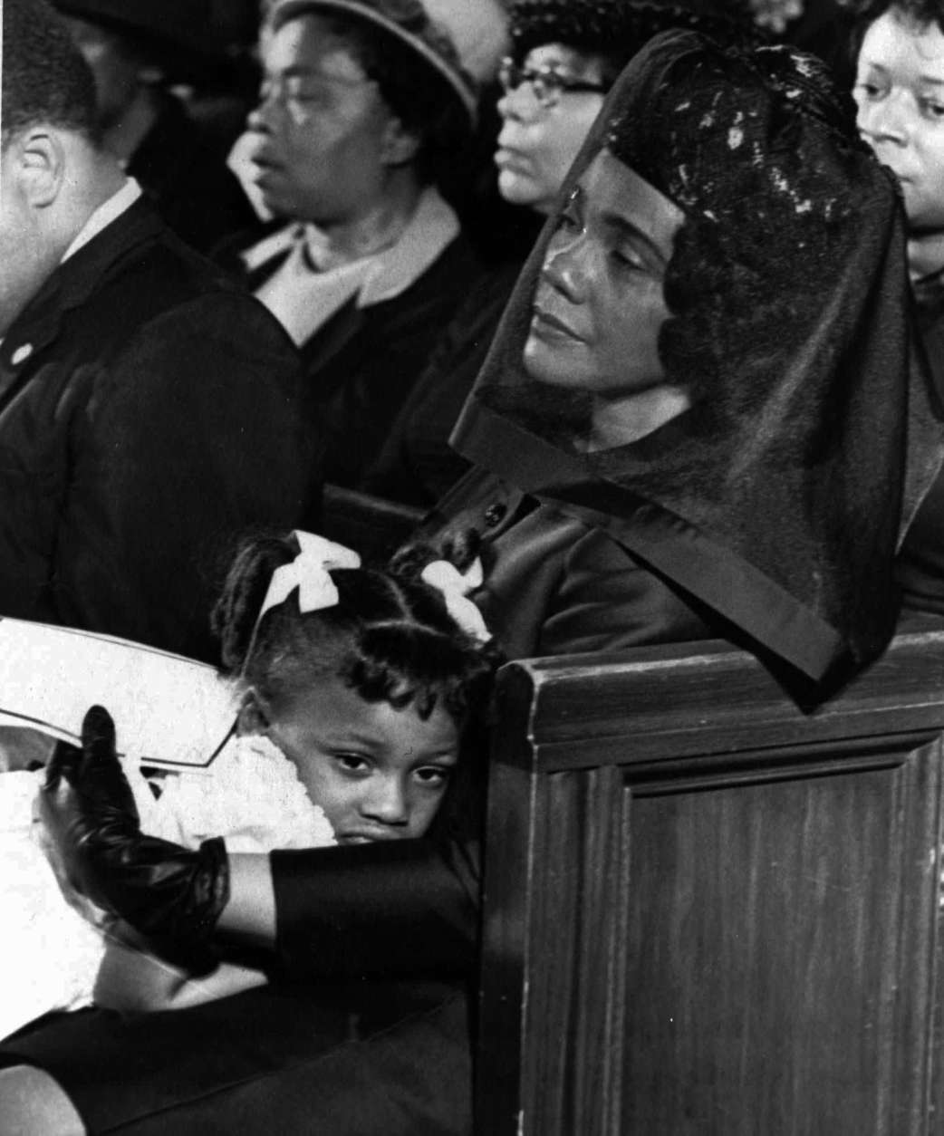 Coretta Scott King and her daughter, Bernice are shown April 9, 1968, in Atlanta, Ga. attending the funeral of her husband, Martin Luther King, Jr., in this Pulitzer-prize winning photograph taken by Moneta J. Sleet, Jr., the first African-American to win a Pulitzer Prize for photography.  (AP Photo/Moneta J. Sleet, Jr.)