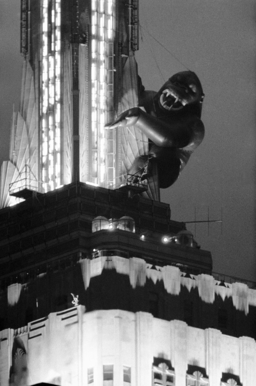 The eight-story ape, King Kong, glares down at Manhattan from the Empire State Building in New York, April 14, 1983. After six days of bad luck and bad weather the 3,000 pound vinyl gorilla was finally inflated on Wednesday. The giant publicity stunt was supposed to be ready on April 7 for the movies 50th anniversary. (AP Photo/Ron Frehm)