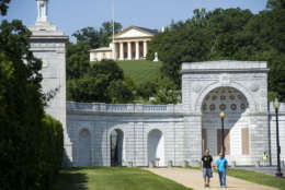 The historic Arlington House mansion, top, is seen at Arlington National Cemetery in Arlington, Va., Thursday, July 17, 2014. The historic house and plantation originally built as a monument to George Washington overlooking the nations capital that later was home to Confederate Gen. Robert E. Lee and 63 slaves will be restored to its historical appearance after a $12.3 million gift. (AP Photo/Cliff Owen)