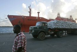 A truck carrying World Food Programe maize drives past the Norwegian-registered Bow Asir, Monday, April 13, 2009 after it  arrived in the port of Mombasa. The owner of a Norwegian tanker says it has been released by Pirates, two weeks after it was seized off the Somali coast, and all 27 of its crew members are unhurt.The 23,000-ton Bow Asir was captured 250 miles (400 kilometers) off the Somali coast March 26 when 16 to 18 pirates carrying machine guns boarded it and took control. (AP Photo / Karel Prinsloo)