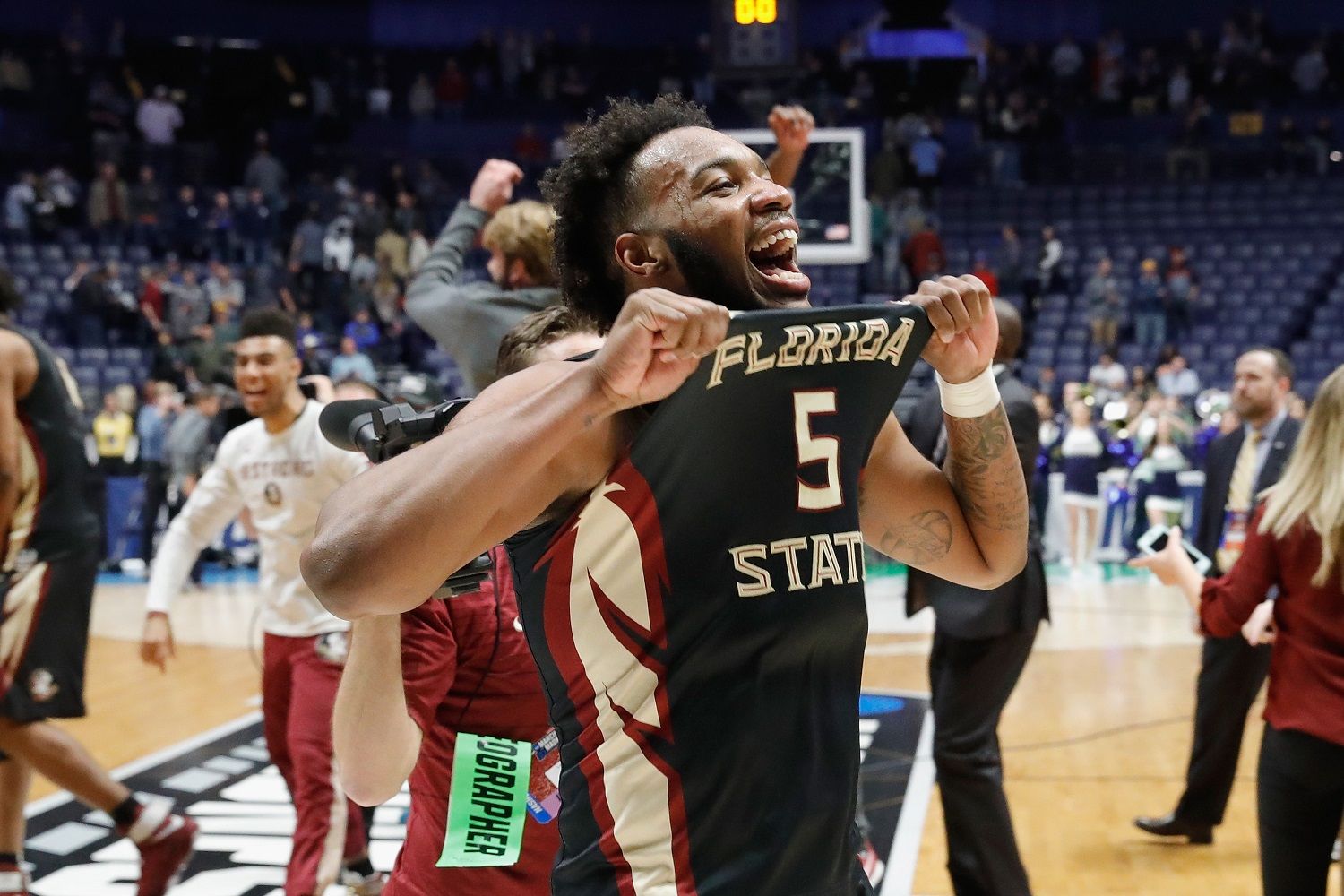 NASHVILLE, TN - MARCH 18:  PJ Savoy #5 of the Florida State Seminoles reacts after defeating the Xavier Musketeers during the second half in the second round of the 2018 Men's NCAA Basketball Tournament at Bridgestone Arena on March 18, 2018 in Nashville, Tennessee.  (Photo by Frederick Breedon/Getty Images)