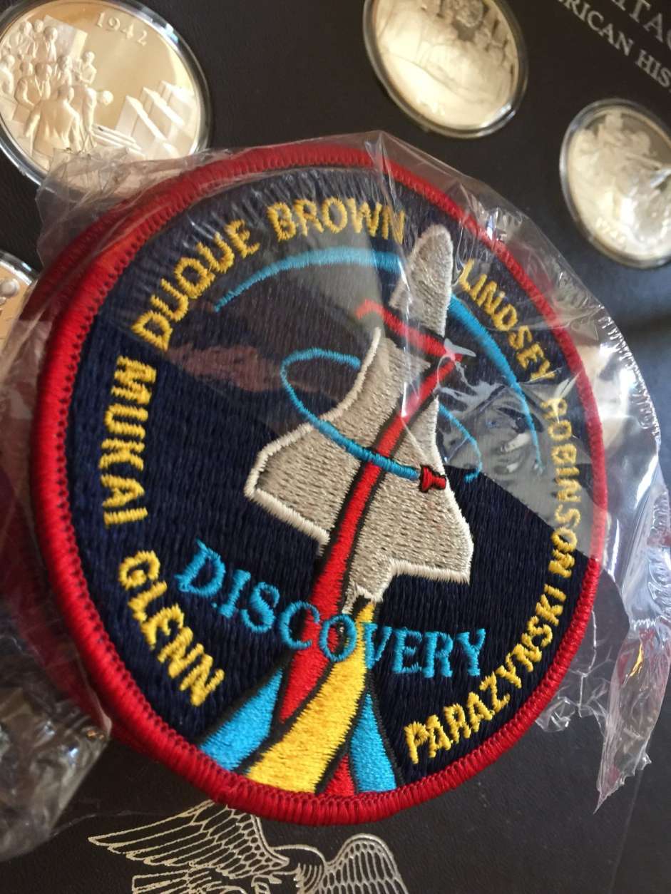 A patch from the Discovery mission, ion which John Glenn became the oldest man in space, from Glenn's estate. (WTOP/Kristi King)