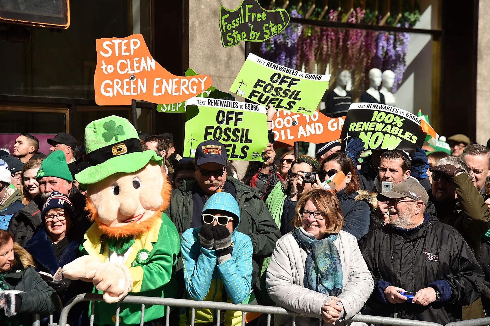 Some people held up signs of protest at the St. Patrick's Day parade in New York. (Theo Wargo/Getty Images)