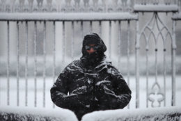 WASHINGTON, DC - MARCH 21: Snow falls as a member of the U.S. Secret Service stands guard in front of the White House on March 21, 2018 in Washington, DC. The East Coast is experiencing a fourth nor'easter in recent weeks. (Photo by Mark Wilson/Getty Images)