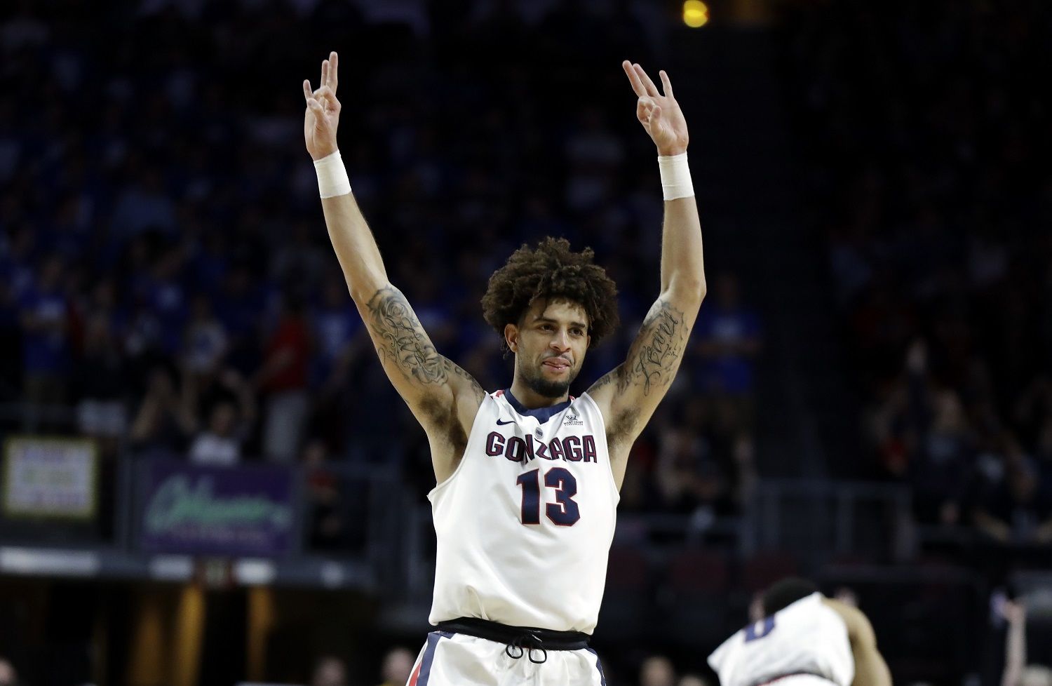 Gonzaga's Josh Perkins reacts after sinking a 3-point shot during the second half of the West Coast Conference tournament championship NCAA college basketball game BYU Tuesday, March 6, 2018, in Las Vegas. Gonzaga defeated BYU 74-54. (AP Photo/Isaac Brekken)