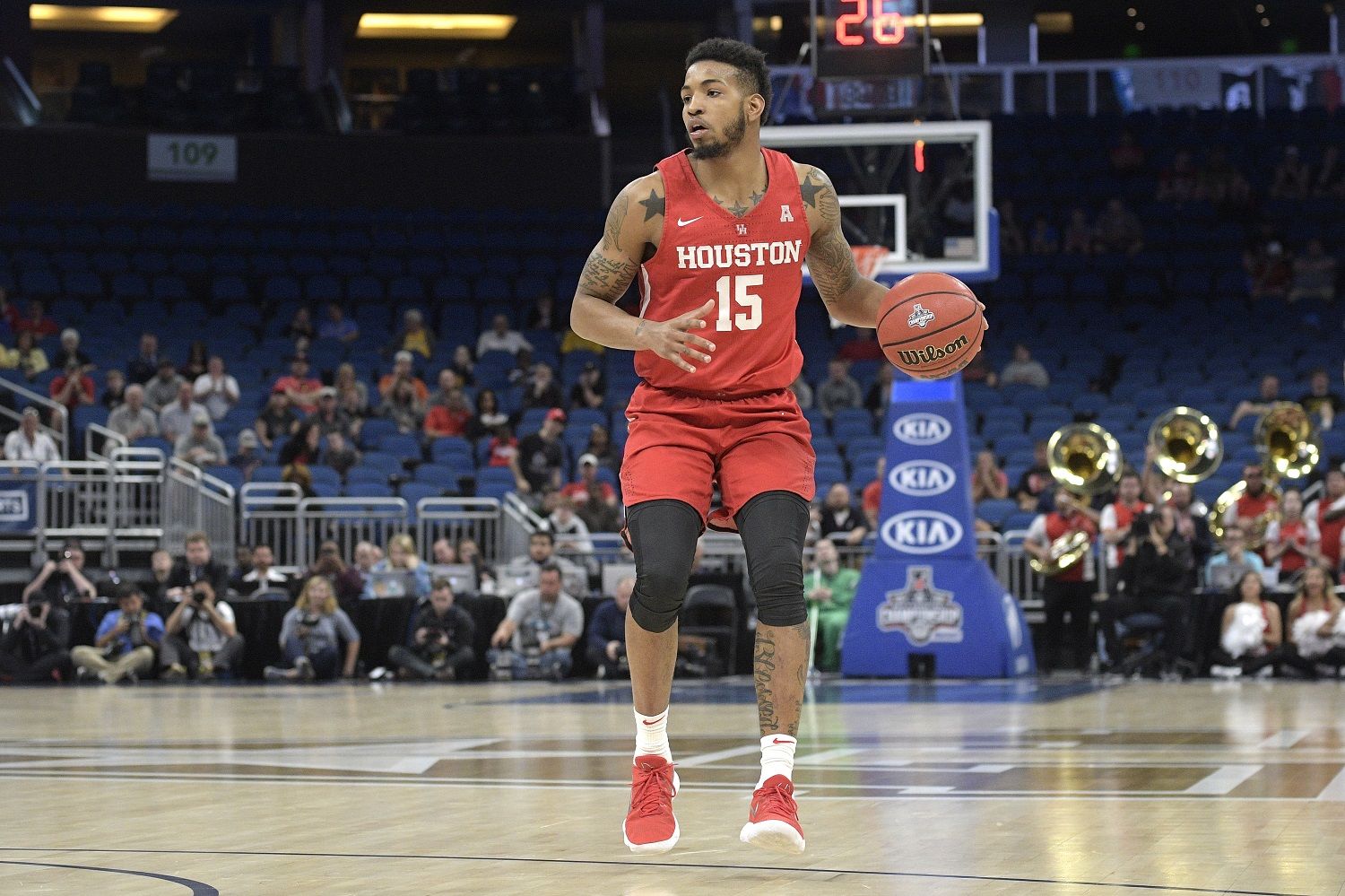 Houston forward Devin Davis (15) sets up a play during the first half of an NCAA college basketball championship game against Cincinnati at the American Athletic Conference tournament Sunday, March 11, 2018, in Orlando, Fla. (AP Photo/Phelan M. Ebenhack)